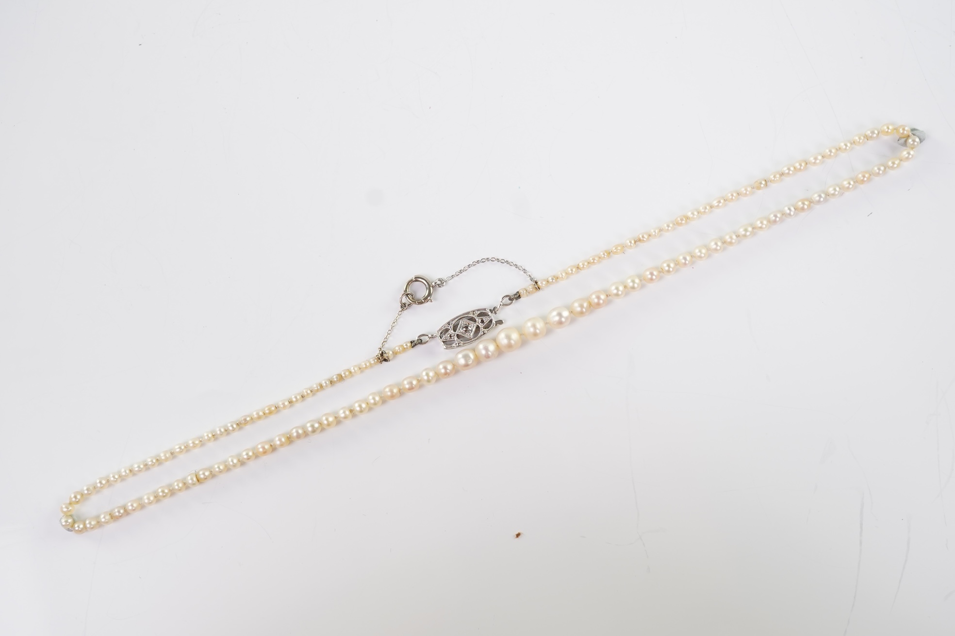 A cultured pearl and diamond necklace, early 20th century